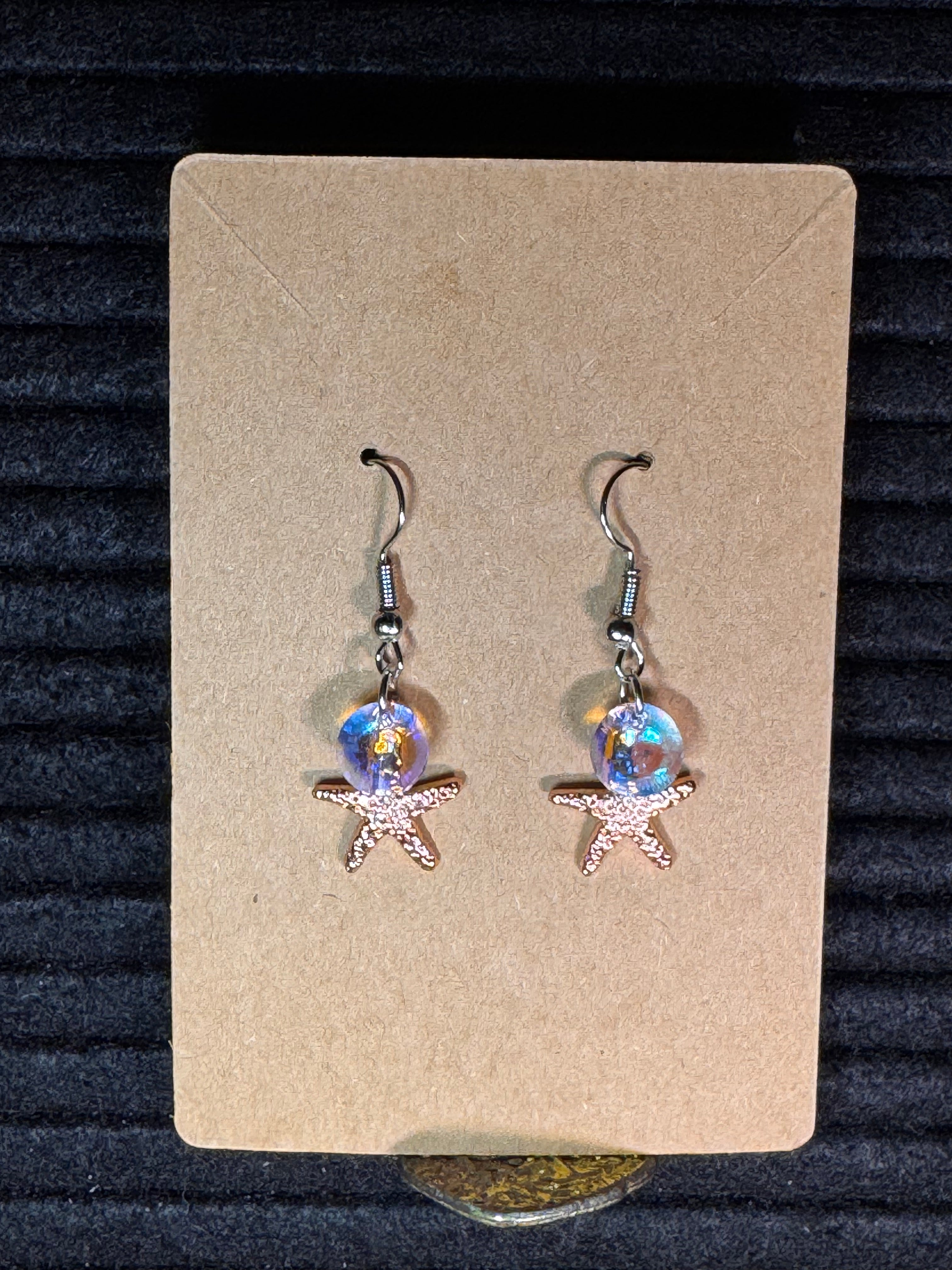 Shiny Starfish dangle earrings rose gold/iridescent